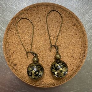 Dangle costume jewelry earrings